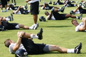 Athletes Stretching Athletes Stretching - Preseason for High School Sports