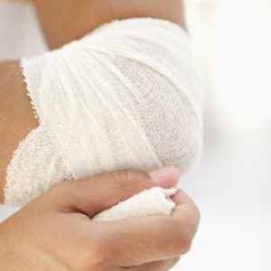 Wrapping and Cleaning an Injury