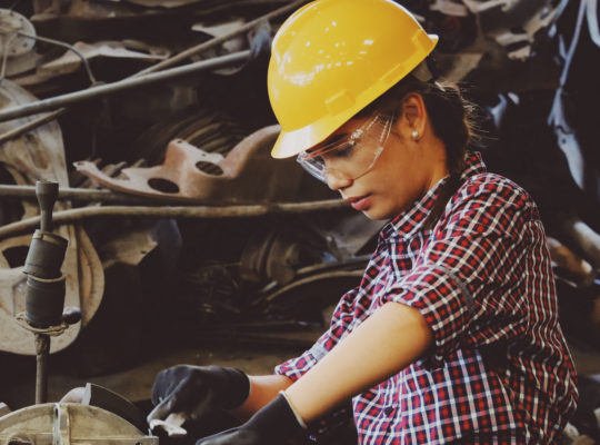 female factory worker wearing appropriate ppe