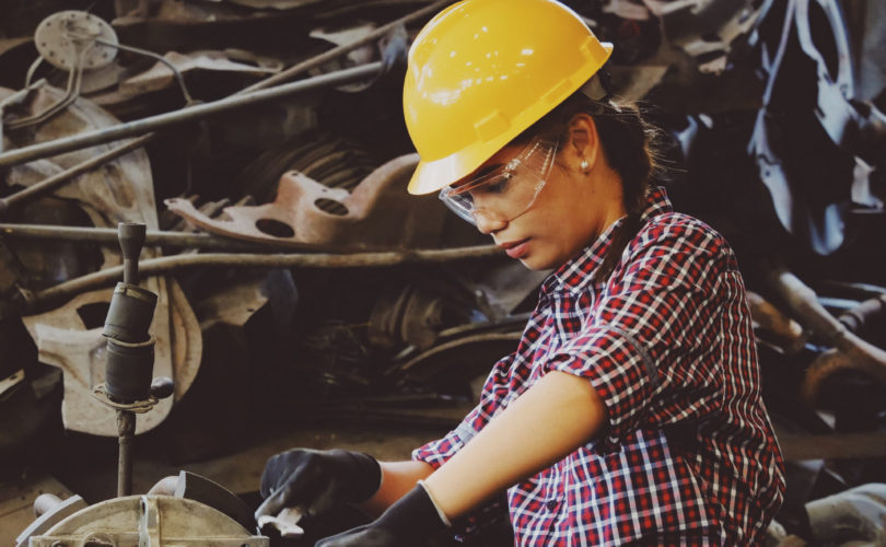 female factory worker wearing appropriate ppe
