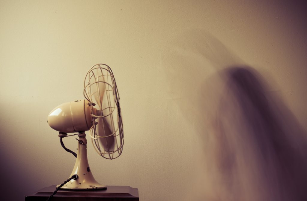 person using a fan