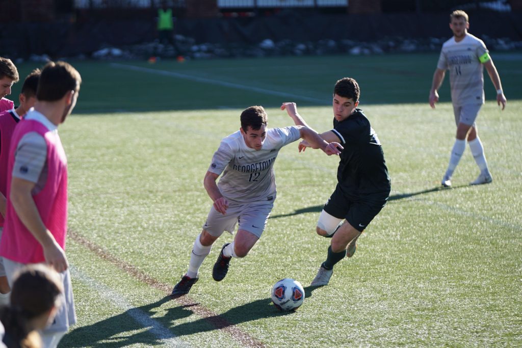 boys playing soccer 