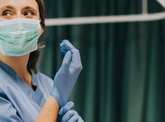 woman wearing nitrile gloves