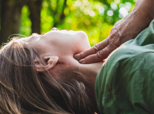 fainted woman lying down outside