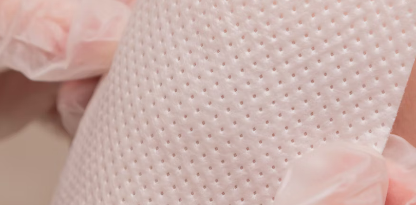 applying a bandage to skin