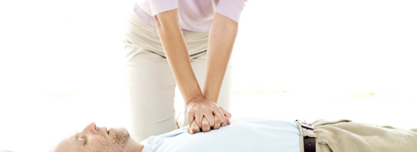 woman doing cpr on a man-01