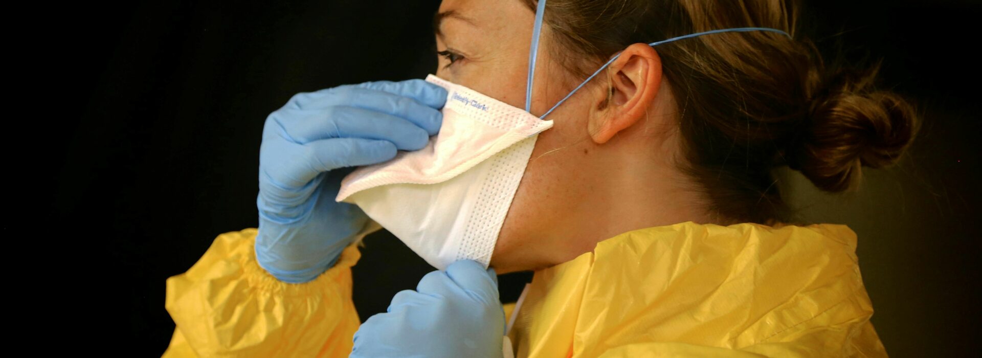 ppe-mask-girl-hazmat-gloves-scaled